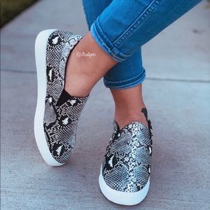 Snake print slip on sneaker